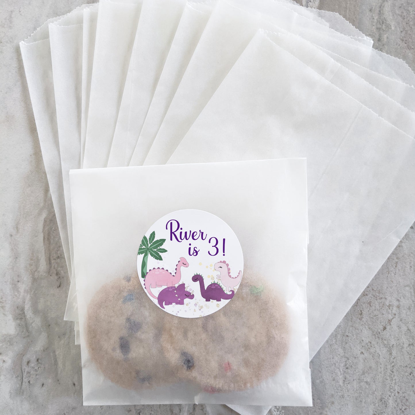 Treat bags and stickers kit - Includes glassine treat bags with 2" and 1" customized stickers - Pink and Purple Dinosaurs / PD23